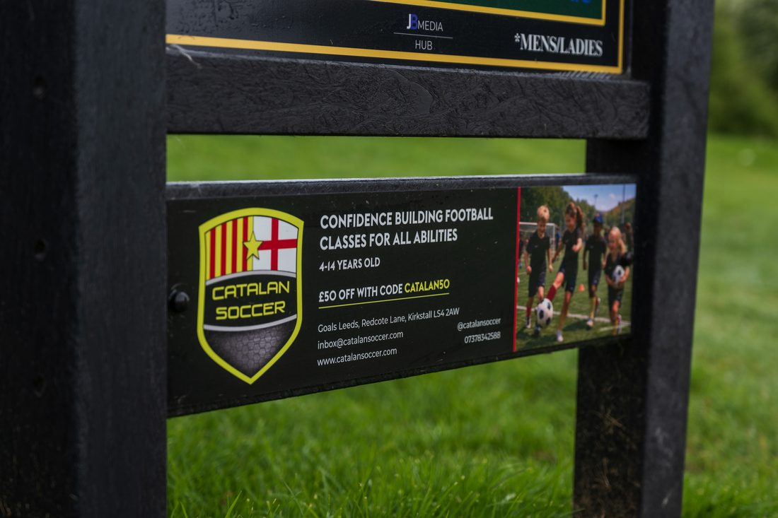 Catalan Soccer’s panel on a JB tee sign